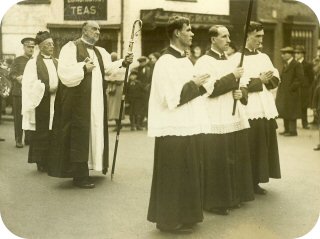 Canon James assists the Bishop in 1935